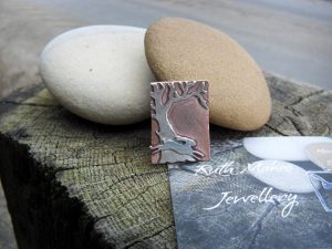 Sterling silver and copper Leaping Hare in the Woods brooch
